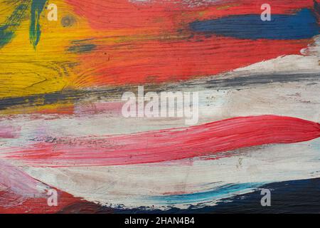 Colored stripes of red white paint on wooden board horizontal photography, textured background for design Stock Photo