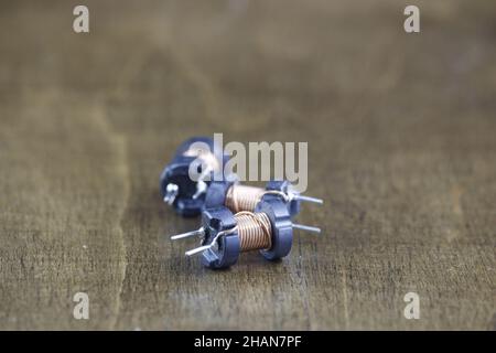 Copper coil, inductor winding part on a pc motherboard, circuit board ...
