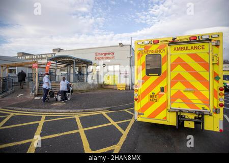 Ambulance parked outside main entrance to the Emergency Department of Dundonald Hospital in Belfast, Northern Ireland. Stock Photo