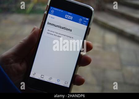 Yeovil, Somerset, England - December 14 2021: Error message on the NHS smartphone app whilst trying to access list of Covid-19 immunisations Stock Photo