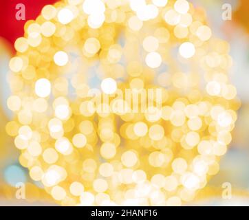 Defocusing effect in the form of bright yellow circular bokeh. Stock Photo
