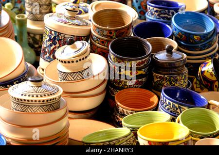 A street shop with oriental ceramics. Teapots, plates and bowls. Bowls, plates and tea cups in souvenir shop in Pune, Sale during Festival, Traditiona Stock Photo