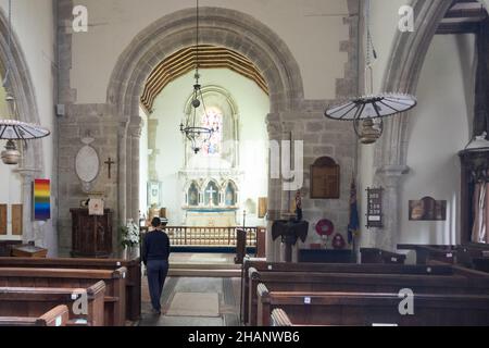 Ancient,old,Saxon,church,with,early Norman chancel arch,Church of St Mary,Stoughton Church,Stoughton,West,Sussex,West Sussex,England,English,GB,Great Britain,Britain,UK,United Kingdom,Europe,European,With gravestones as footpaths, and borders, Stock Photo