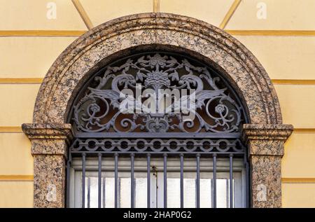 Ancient window with grid detail Stock Photo