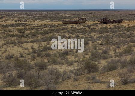 Ship graveyard in former Aral sea port town Moynaq Mo ynoq or Muynak , Uzbekistan Stock Photo