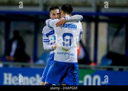 ZWOLLE, NETHERLANDS - DECEMBER 14: Luka Adzic of PEC Zwolle, Slobodan Tedic of PEC Zwolle celebrate after scoring their teams third goal during the Dutch TOTO KNVB Cup match between PEC Zwolle and MVV Maastricht at MAC 3 Park Stadion on December 14, 2021 in Zwolle, Netherlands (Photo by Peter Lous/Orange Pictures) Stock Photo