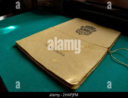 Vintage brown file on a green table Stock Photo