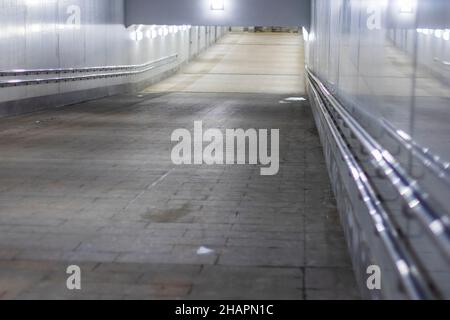 underground tunnel crossing empty corridor empty dark city urban Stock Photo
