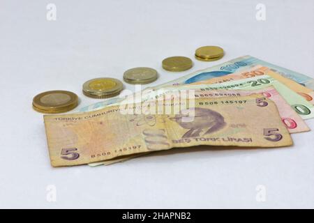 Turkish lira banknotes and coins isolated on the white background Stock Photo