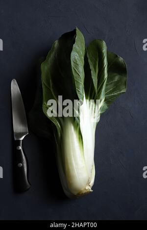 Bunch of organic chard isolated on dark background. Directly above. Stock Photo