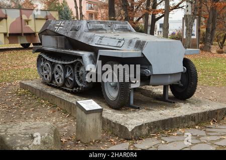 German half-track armoured personnel carrier Sd.Kfz. 250 used during World War II on display next to the Museum of the Slovak National Uprising (Múzeum Slovenského národného povstania) in Banská Bystrica, Slovakia. Stock Photo