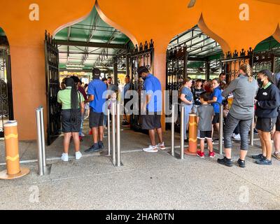 Tampa, FL USA - November 11, 2021:  The lines of people at the entrance to Busch Gardens in Tampa, Florida. Stock Photo