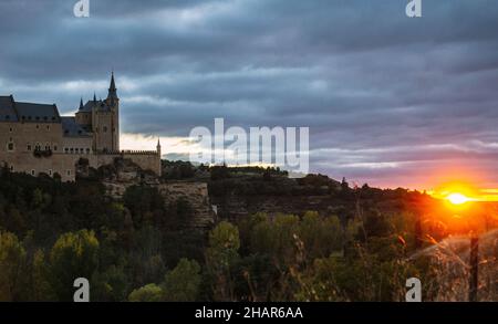 Sunset at Alcazar of Segovia, medieval castle and palace in Spain. Stock Photo