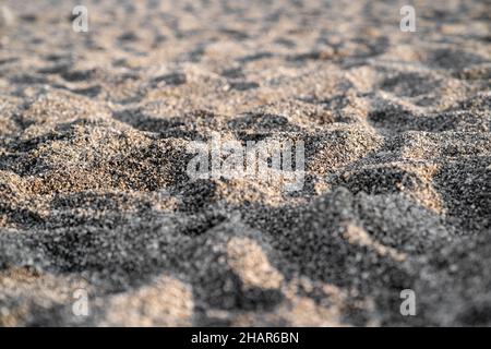 Background texture of beach loose sand with soft focus Stock Photo