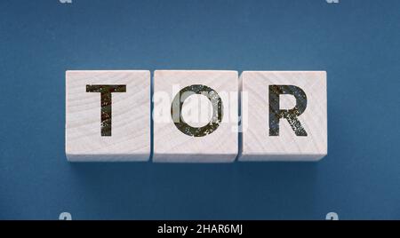 Tor anonymous by letters on a woden blocks on black. Business concept. Stock Photo