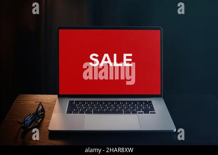 Sale on laptop screen Stock Photo