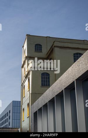 Milan, Italy: The Haunted House designed by Rem Koolhaas, covered with a layer of gold leaf, is one of the buildings of the Fondazione Prada Stock Photo