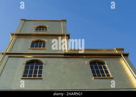 Milan, Italy: The Haunted House designed by Rem Koolhaas, covered with a layer of gold leaf, is one of the buildings of the Fondazione Prada Stock Photo