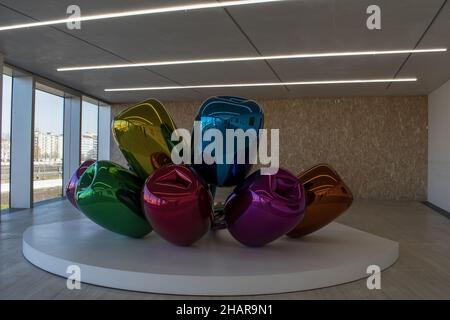 Milan, Italy: Tulips (1995-2004) by Jeff Koons, a bouquet of large colored flowers in stainless steel, at the Fondazione Prada Stock Photo