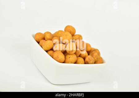 Coated Peanuts in Bowl, Spicy Snacks Namkeen Stock Photo