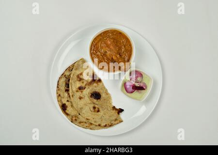 Butter Chicken Roti with Onion Chutney Isolated on White Background Stock Photo