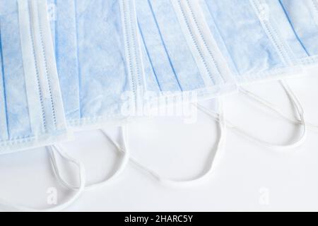 Three ply structure,single use hygenic face mask on white background with copy space. Stock Photo