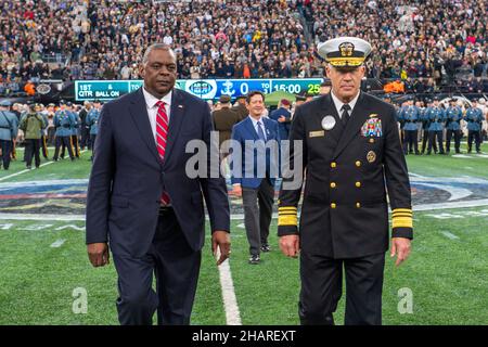 East Rutherford, United States of America. 11 December, 2021. U.S. Secretary of Defense Lloyd J. Austin III, and Superintendent of the U.S. Naval Academy, Vice Adm. Sean Buck, right, walk back from the coin toss during the annual Army-Navy football game at Metlife Stadium December 11, 2021 in East Rutherford, New Jersey. The U.S. Naval Academy Midshipmen defeated the Army Black Knights 17-13 in their 122nd matchup.  Credit: MC3 Thomas Bonaparte Jr./DOD/Alamy Live News Stock Photo