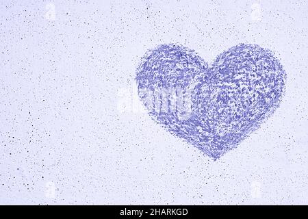 Purple heart chalk drawn on white wall, copy space Stock Photo