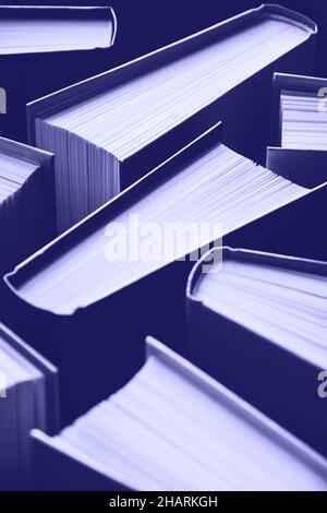 Books background purple toned toned Stock Photo
