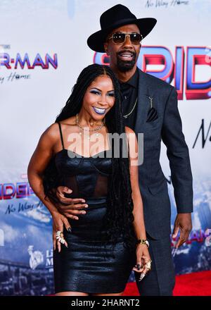 Westwood, United States. 13th Dec, 2021. WESTWOOD, LOS ANGELES, CALIFORNIA, USA - DECEMBER 13: Singer Shahidah Omar and husband/actor JB Smoove arrive at the Premiere Of Columbia Pictures' 'Spider-Man: No Way Home' held at the Regency Village Theatre on December 13, 2021 in Westwood, Los Angeles, California, United States. ( Credit: Image Press Agency/Alamy Live News Stock Photo