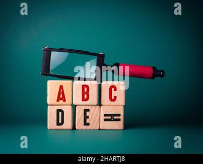 English Text Written on Wooden Cubes Stock Photo