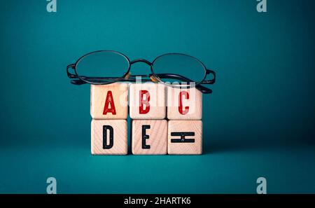 English Text Written on Wooden Cubes Stock Photo