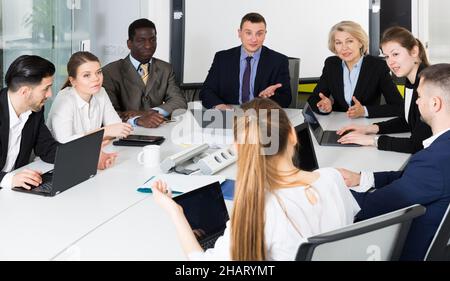 coworkers developing strategy for teamwork Stock Photo
