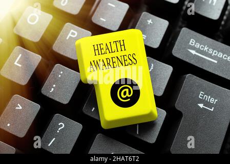 Hand writing sign Health Awareness. Internet Concept Promoting community issues and preventative action Typing Online Website Informations, Editing Stock Photo