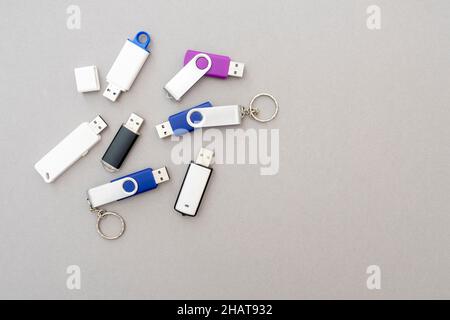 Heap of an old used USB flash drives, top view Stock Photo