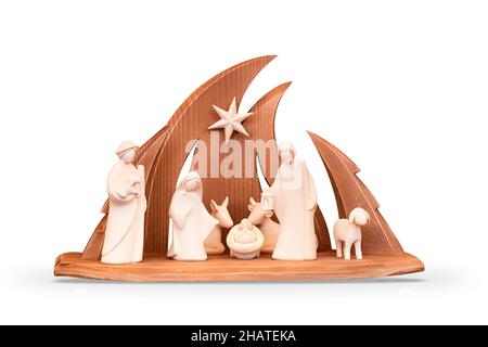 Nativity. Scene from ceramic or wooden figurines of the Nativity. Christmas composition. Stock Photo