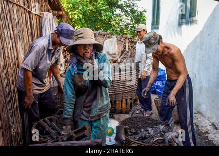 Coal furnace workers prepare to deliver goods to the market Stock Photo