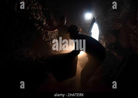 Coal furnace workers prepare to deliver goods to the market Stock Photo