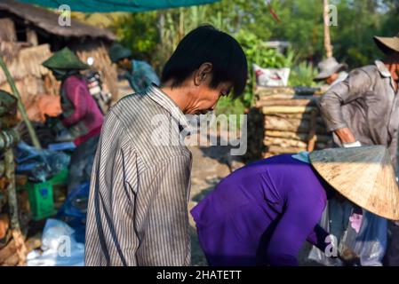 Coal furnace workers prepare to deliver goods to the market Stock Photo