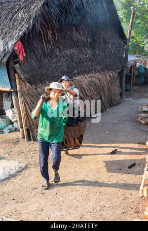 Coal furnace workers prepare to deliver goods to the market Stock Photo