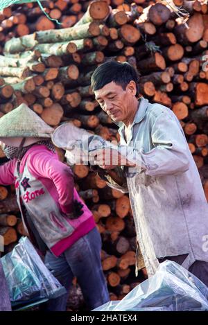 Coal furnace workers prepare to deliver goods to the market Stock Photo