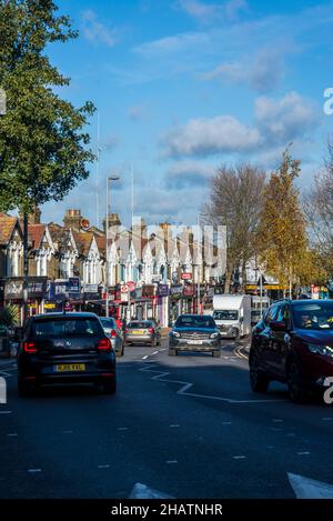 A row of houses and shops on Hoe Street, Walthamstow, London, England, UK Stock Photo