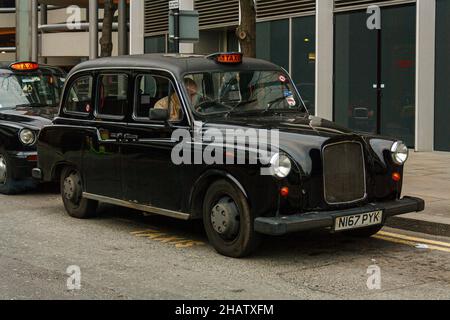 London, United Kingdom; March 16th 2011: Typical London taxi. Stock Photo