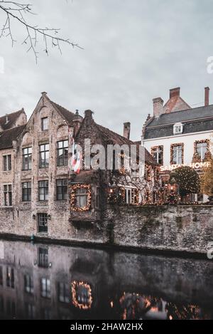 BELGIUM, BRUGES, DECEMBER 2021: The beautiful buildings of Bruges, the belgian UNESCO World Heritage city Stock Photo