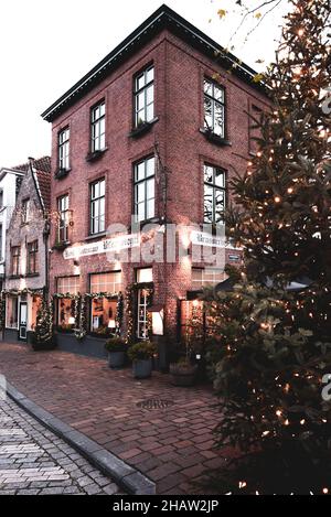 BELGIUM, BRUGES, DECEMBER 2021: The beautiful buildings of Bruges, the belgian UNESCO World Heritage city Stock Photo