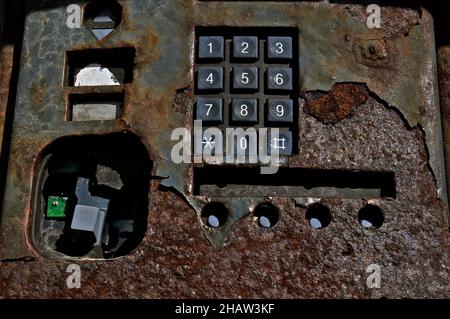 Rusty and broken public telephone, Isleta del Moro, Cabo de Gata, Andalucia, Spain Stock Photo