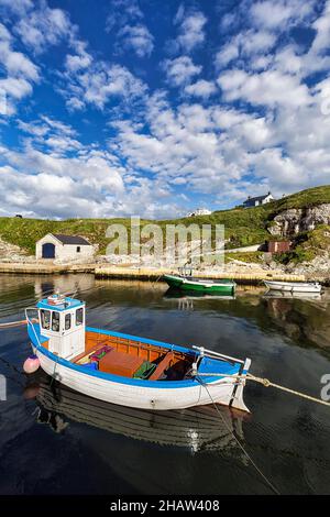 Fishing boats in the harbour, Ballintoy Harbour, Antrim, Northern Ireland, Great Britain Stock Photo