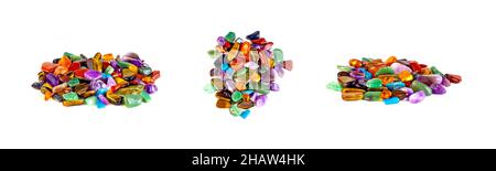 Different colorful semiprecious mineral gemstones heap set isolated on white background. Stock Photo