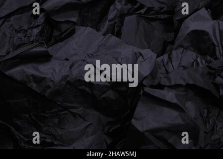 Abstract black paper texture background. Top view. Copy space. Stock Photo