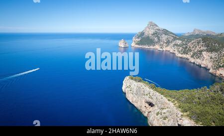 Panoramic view from viewpoint Punta Nau on rocky cliff with rocky island El Colomer and Mediterranean Sea, Peninsula Formentor, Majorca, Spain Stock Photo